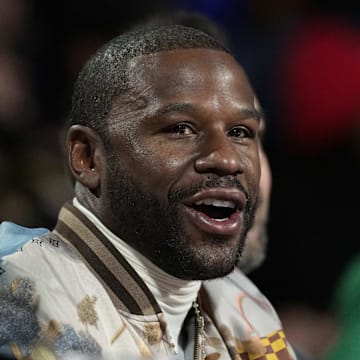 Dec 14, 2024; Las Vegas, Nevada, USA; Floyd Mayweather looks on during the first half between the Milwaukee Bucks and the Atlanta Hawks in a semifinal of the 2024 Emirates NBA Cup at T-Mobile Arena. Mandatory Credit: Kyle Terada-Imagn Images