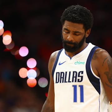 Oct 26, 2024; Phoenix, Arizona, USA; Dallas Mavericks guard Kyrie Irving (11) reacts against the Phoenix Suns at Footprint Center. Mandatory Credit: Mark J. Rebilas-Imagn Images