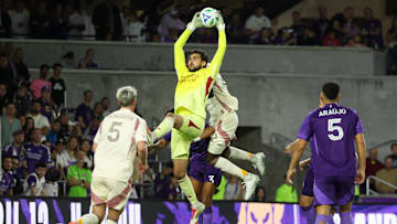 Mar 22, 2025; Orlando, Florida, USA; Orlando City goalkeeper Javier Otero (12) controls the ball against D.C. United in the second half at Inter&;Co Stadium. Mandatory Credit: Nathan Ray Seebeck-Imagn Images