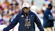 Oct 4, 2025; Fort Worth, Texas, USA; Colorado Buffaloes head coach Deion Sanders on the field during warm ups prior to a game against the TCU Horned Frogs at Amon G. Carter Stadium. Mandatory Credit: Raymond Carlin III-Imagn Images