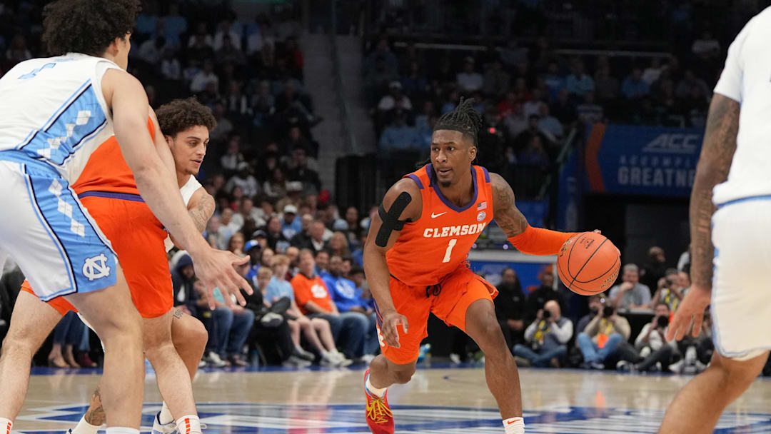 Mar 12, 2026; Charlotte, NC, USA; Clemson Tigers guard Jestin Porter (1) with the ball in the first half at Spectrum Center. Mandatory Credit: Bob Donnan-Imagn Images Mar 12, 2026; Charlotte, NC, USA; Clemson Tigers guard Jestin Porter (1) with the ball in the first half at Spectrum Center. Mandatory Credit: Bob Donnan-Imagn Images