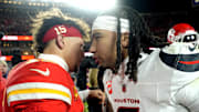 Jan 18, 2025; Kansas City, Missouri, USA; Kansas City Chiefs quarterback Patrick Mahomes (15) meets with Houston Texans quarterback C.J. Stroud (7) after a 2025 AFC divisional round game at GEHA Field at Arrowhead Stadium. Mandatory Credit: Jay Biggerstaff-Imagn Images