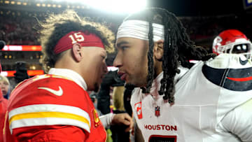 Jan 18, 2025; Kansas City, Missouri, USA; Kansas City Chiefs quarterback Patrick Mahomes (15) meets with Houston Texans quarterback C.J. Stroud (7) after a 2025 AFC divisional round game at GEHA Field at Arrowhead Stadium. Mandatory Credit: Jay Biggerstaff-Imagn Images