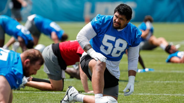 Detroit Lions offensive tackle Penei Sewell (58) practices during mini camp at Detroit Lions headquarters and practice facility in Allen Park on Tuesday, June 4, 2024.