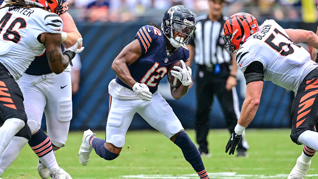 Aug 17, 2024; Chicago, Illinois, USA; Chicago Bears wide receiver Velus Jones Jr. (12) runs the ball against the Cincinnati Bengals during the third quarter at Soldier Field. Mandatory Credit: Daniel Bartel-Imagn Images