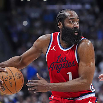 May 3, 2025; Denver, Colorado, USA; LA Clippers guard James Harden (1) prepares to pass the ball in the second quarter against the Denver Nuggets during game seven of first round for the 2025 NBA Playoffs at Ball Arena. Mandatory Credit: Ron Chenoy-Imagn Images