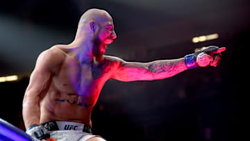Jun 29, 2024; Las Vegas, Nevada, USA; Jean Silva (blue gloves) reacts after knocking out Charles Jourdain (not pictured) during UFC 303 at T-Mobile Arena. Mandatory Credit: Mark J. Rebilas-Imagn Images