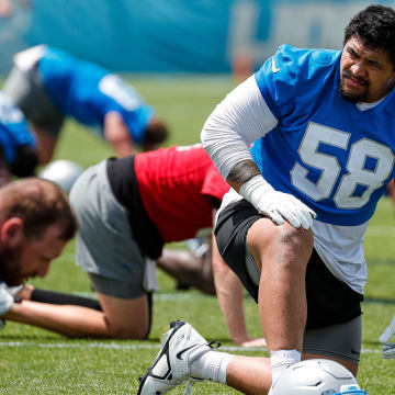 Detroit Lions offensive tackle Penei Sewell (58) practices during mini camp at Detroit Lions headquarters and practice facility in Allen Park on Tuesday, June 4, 2024.