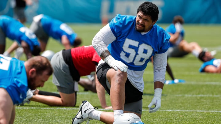 Detroit Lions offensive tackle Penei Sewell (58) practices during mini camp at Detroit Lions headquarters and practice facility in Allen Park on Tuesday, June 4, 2024.