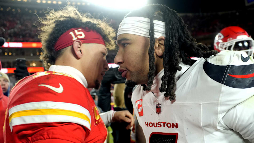 Jan 18, 2025; Kansas City, Missouri, USA; Kansas City Chiefs quarterback Patrick Mahomes (15) meets with Houston Texans quarterback C.J. Stroud (7) after a 2025 AFC divisional round game at GEHA Field at Arrowhead Stadium.