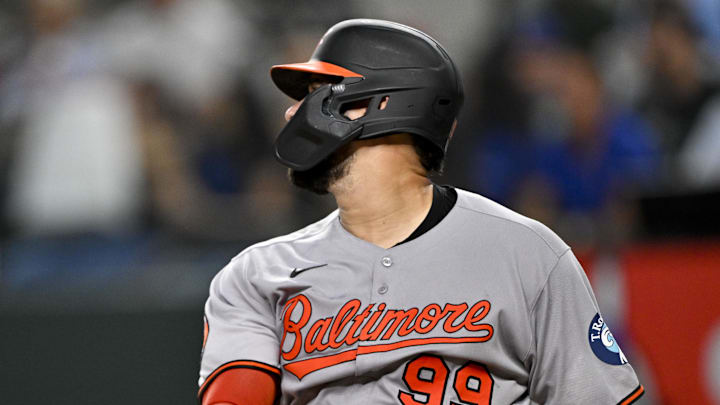 Jun 30, 2025; Arlington, Texas, USA; Baltimore Orioles designated hitter Gary Sanchez (99) hits a single against the Texas Rangers during the fifth inning at Globe Life Field. Mandatory Credit: Jerome Miron-Imagn Images
