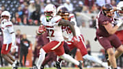 Nov 1, 2025; Blacksburg, Virginia, USA; Louisville Cardinals running back Keyjuan Brown (22) runs the ball for a touchdown against the Virginia Tech Hokies during the fourth quarter at Lane Stadium. Mandatory Credit: Brian Bishop-Imagn Images