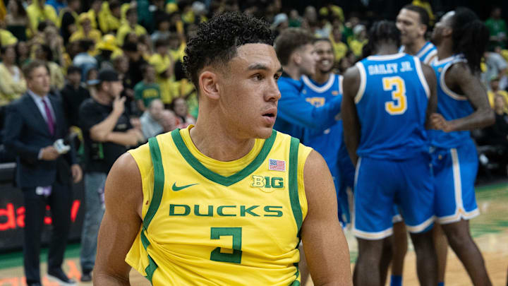 Oregon’s Jackson Shelstad leaves the court as UCLA players celebrate their last second win at Matthew Knight Arena in Eugene, Oregon Sunday, Dec 8, 2024. Oregon’s Jackson Shelstad leaves the court as UCLA players celebrate their last second win at Matthew Knight Arena in Eugene, Oregon Sunday, Dec 8, 2024.