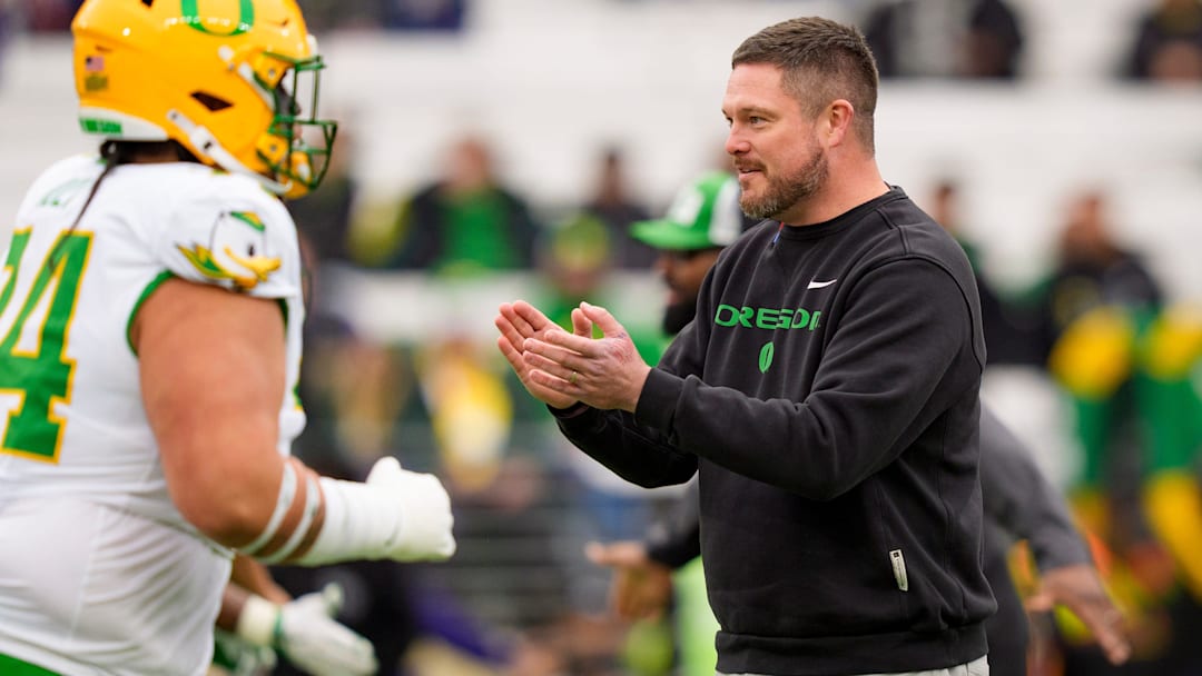 Oregon head coach Dan Lanning walks the field during warmups as the Oregon Ducks take on the Washington Huskies on Nov. 29, 2025, at Husky Stadium in Seattle, Washington. Oregon head coach Dan Lanning walks the field during warmups as the Oregon Ducks take on the Washington Huskies on Nov. 29, 2025, at Husky Stadium in Seattle, Washington.