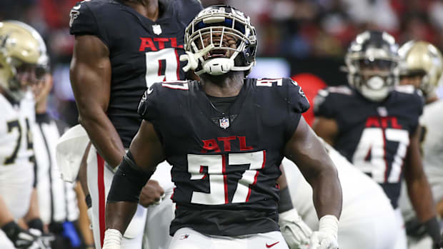 tlanta Falcons defensive end Grady Jarrett (97) celebrates after a sack against the New Orleans Saints