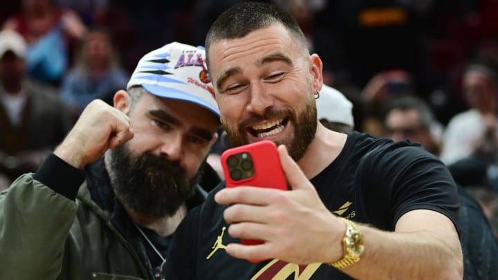 Mar 5, 2024; Cleveland, Ohio, USA; Cleveland natives and NFL players Travis, right, and Jason Kelce celebrate after the Cleveland Cavaliers beat the Boston Celtics during the second half at Rocket Mortgage FieldHouse. Mandatory Credit: Ken Blaze-USA TODAY Sports