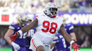 Sep 27, 2025; Seattle, Washington, USA; Ohio State Buckeyes defensive lineman Kayden McDonald (98) celebrates a sack against the Washington Huskies during the fourth quarter at Husky Stadium. Mandatory Credit: Joe Nicholson-Imagn Images