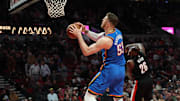 Nov 5, 2025; Portland, Oregon, USA;  Oklahoma City Thunder center/forward Isaiah Hartenstein (55) makes a last second shot in the first half against the Portland Trail Blazers at Moda Center. Mandatory Credit: Jaime Valdez-Imagn Images


