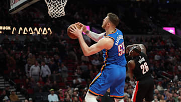 Nov 5, 2025; Portland, Oregon, USA;  Oklahoma City Thunder center/forward Isaiah Hartenstein (55) makes a last second shot in the first half against the Portland Trail Blazers at Moda Center. Mandatory Credit: Jaime Valdez-Imagn Images

