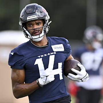 Jun 10, 2025; Houston, TX, USA; Houston Texans wide receiver Jared Wayne (14) participates in a drill during an NFL football minicamp at NRG Stadium. Mandatory Credit: Maria Lysaker-Imagn Images 
