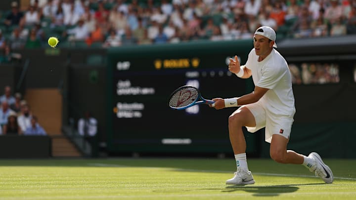 Jack Draper hits a forehand
