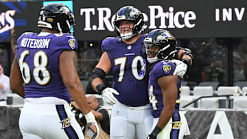 Aug 7, 2025; Baltimore, Maryland, USA; Baltimore Ravens running back Keaton Mitchell (34) celebrates scoring a touchdown with offensive tackle Roger Rosengarten (70) and offensive tackle Joseph Noteboom (68) against the Indianapolis Colts during the first quarter at M&T Bank Stadium. Mandatory Credit: Rafael Suanes-Imagn Images
