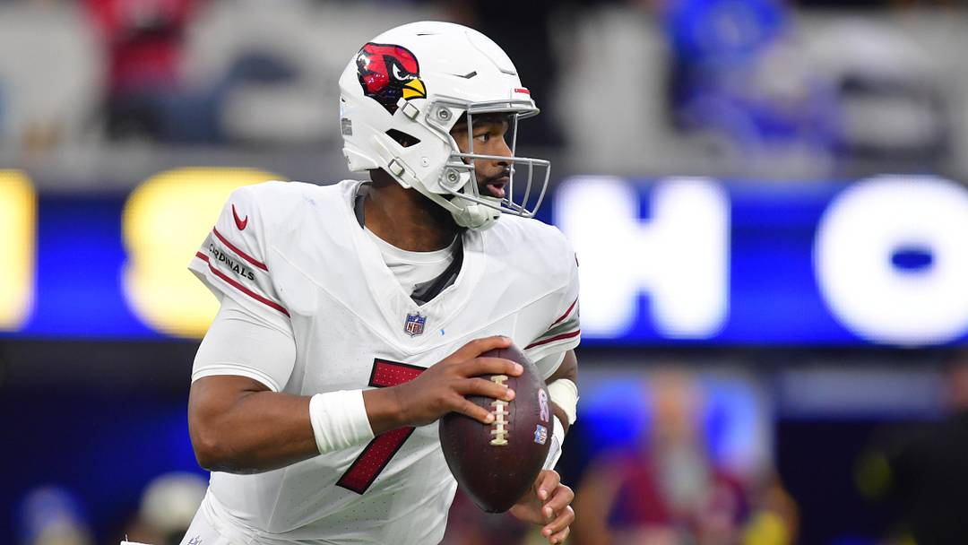 Jan 4, 2026; Inglewood, California, USA;  Arizona Cardinals quarterback Jacoby Brissett (7) rolls out against the Los Angeles Rams during the second half at SoFi Stadium. Mandatory Credit: Gary A. Vasquez-Imagn Images