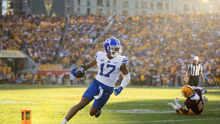 Nov 23, 2024; Tempe, Arizona, USA; Brigham Young Cougars wide receiver Keelan Marion (17) scores a touchdown against the Arizona State Sun Devils at Mountain America Stadium. Mandatory Credit: Mark J. Rebilas-Imagn Images