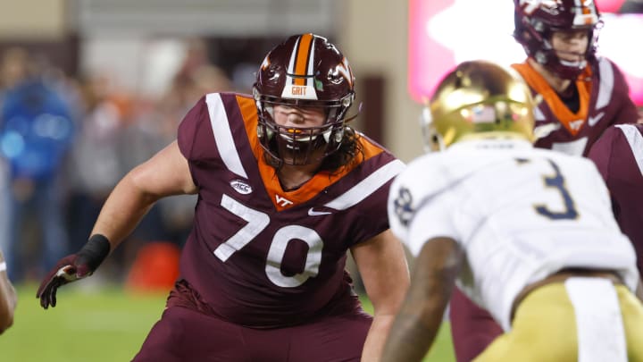 Oct 9, 2021; Blacksburg, Virginia, USA;  Virginia Tech Hokies offensive lineman Parker Clements (70) guards Notre Dame Fighting Irish safety Houston Griffith (3) during the first quarter at Lane Stadium. Mandatory Credit: Reinhold Matay-USA TODAY Sports