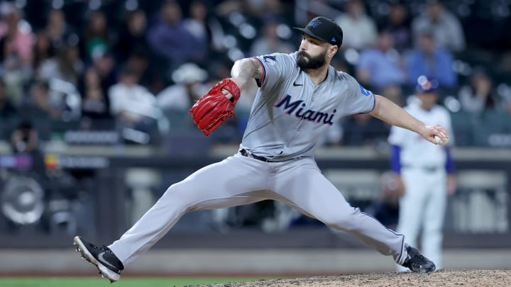 Jun 11, 2024; New York City, New York, USA; Miami Marlins relief pitcher Tanner Scott (66) pitches against the New York Mets during the ninth inning at Citi Field. Mandatory Credit: Brad Penner-USA TODAY Sports