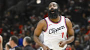Feb 26, 2025; Chicago, Illinois, USA;  LA Clippers guard James Harden (1) looks towards former Chicago Bulls player Pat Beverley, who was on the sidelines, after scoring against the Chicago Bulls during the second half  at the United Center. Mandatory Credit: Matt Marton-Imagn Images