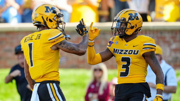 Oct 21, 2023; Columbia, Missouri, USA; Missouri Tigers wide receiver Luther Burden III (3) celebrates with wide receiver Theo Wease Jr. (1) after scoring a touchdown against the South Carolina Gamecocks during the first half at Faurot Field at Memorial Stadium. Mandatory Credit: Jay Biggerstaff-USA TODAY Sports