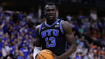 Mar 22, 2025; Denver, CO, USA; Brigham Young Cougars center Keba Keita (13) reacts against the Wisconsin Badgers during the second half in the second round of the NCAA Tournament  at Ball Arena. Mandatory Credit: Isaiah J. Downing-Imagn Images