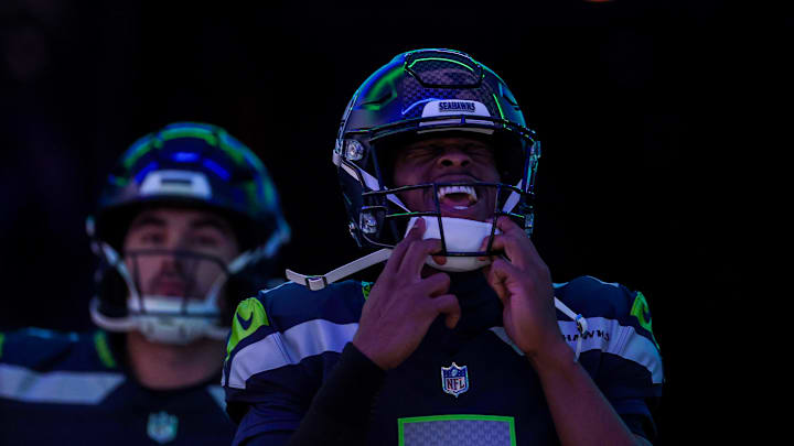 Sam Howell and Geno Smith of the Seattle Seahawks