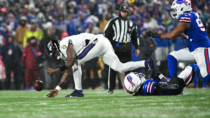 Lamar Jackson fumbles against the Buffalo Bills.