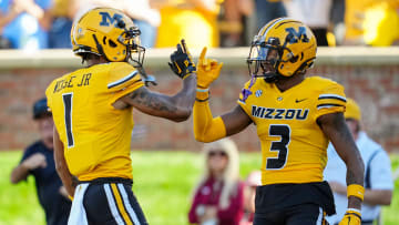 Oct 21, 2023; Columbia, Missouri, USA; Missouri Tigers wide receiver Luther Burden III (3) celebrates with wide receiver Theo Wease Jr. (1) after scoring a touchdown against the South Carolina Gamecocks during the first half at Faurot Field at Memorial Stadium. Mandatory Credit: Jay Biggerstaff-USA TODAY Sports