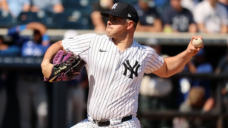 Feb 25, 2024; Tampa, Florida, USA;  New York Yankees starting pitcher Carlos Rodon (55) throws a