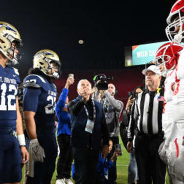 St. John Bosco (left) and Mater Dei during coin flip at the LA Memorial Coliseum in the CIF Southern Section Division 1 final.