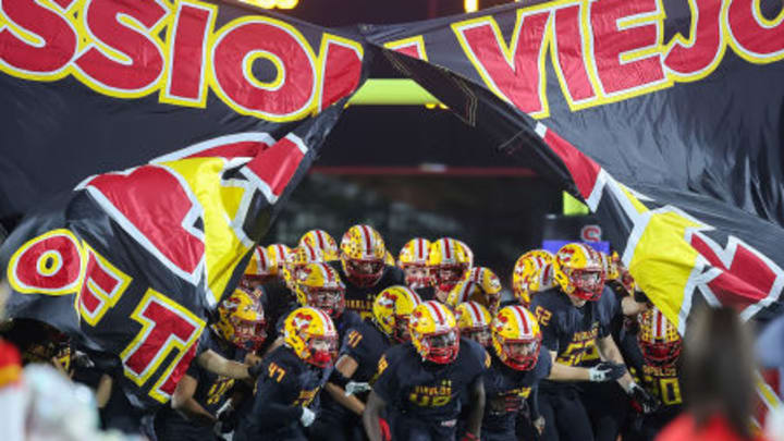 Mission Viejo breaks on the field at Saddleback College before its state Division 1-AA football championship game against De La Salle Dec. 8, 2024. The Diablos won the game 27-14. 