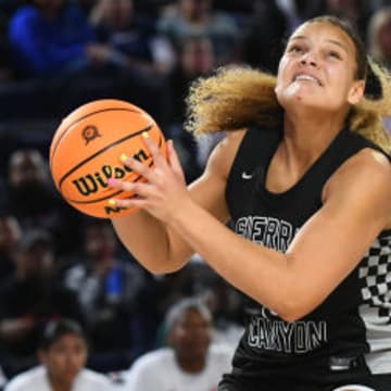 Sierra Canyon incoming junior Jerzy Robinson (left) averaged 22.5 points and 10.8 rebounds last season for the 31-3 Trailblazers