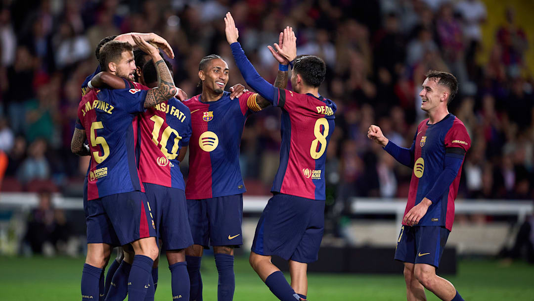 FC Barcelona players celebrate against Sevilla 