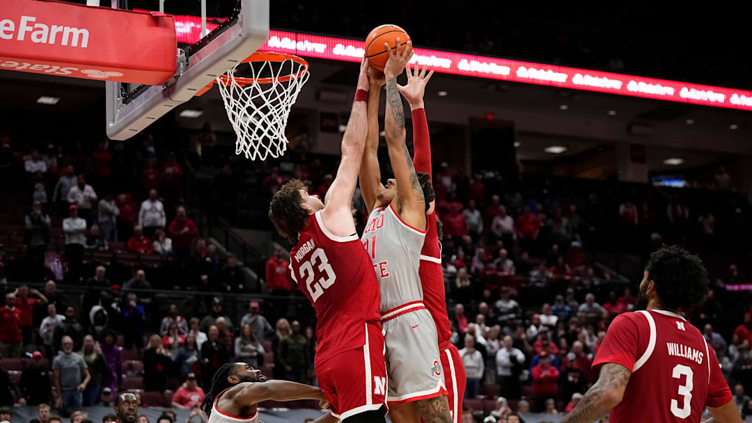 Nebraska Cornhuskers forward Andrew Morgan (23) fould Ohio State Buckeyes forward Devin Royal (21) during the first overtime of the NCAA men's basketball game at Value City Arena in Columbus on March 4, 2025. Ohio State won 116-114 in double overtime.