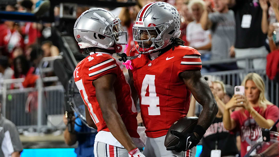 Ohio State Buckeyes wide receiver Carnell Tate (17) celebrates a touchdown by wide receiver Jeremiah Smith (4) during the first half of the NCAA football game against the Minnesota Golden Gophers at Ohio Stadium in Columbus on Oct. 4, 2025.