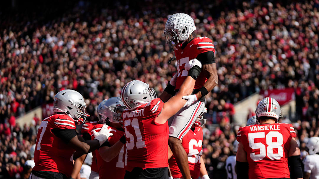 Ohio State Buckeyes wide receiver Carnell Tate (17) celebrates a touchdown with offensive lineman Luke Montgomery (51) during the NCAA football game against the Penn State Nittany Lions at Ohio Stadium in Columbus on Nov. 1, 2025.
