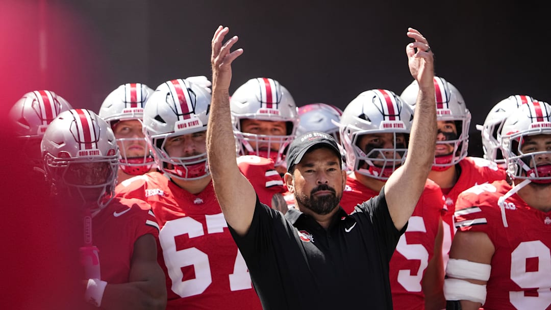Ohio State Buckeyes head coach Ryan Day leads his team onto the field prior to the NCAA football game against the Texas Longhorns at Ohio Stadium on Aug. 30, 2025.