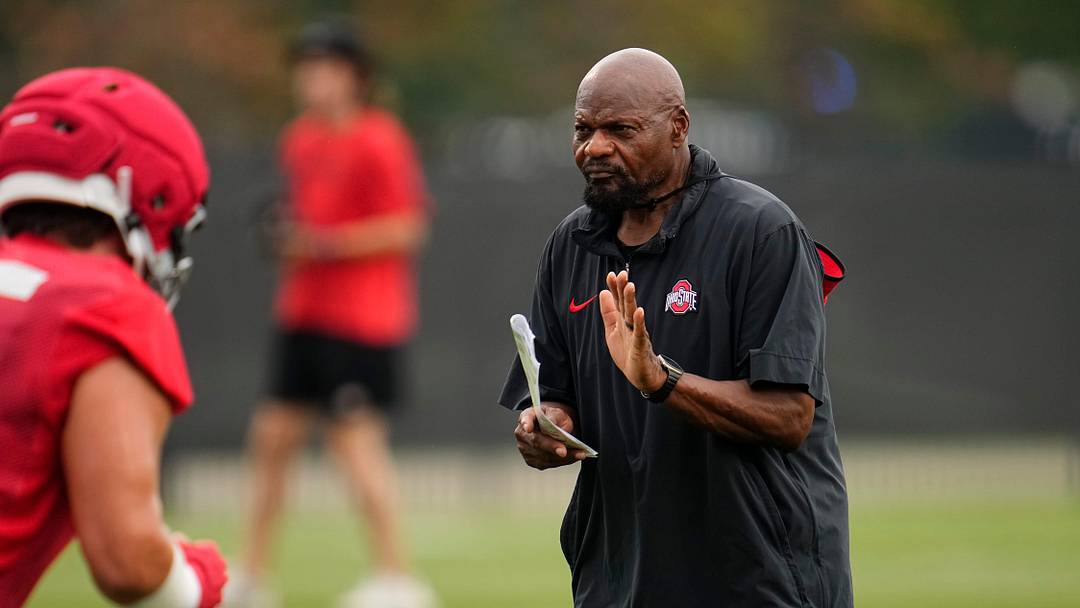Ohio State Buckeyes defensive line coach Larry Johnson leads his squad during the first football practice of the season at the Woody Hayes Athletic Center on July 31, 2025.