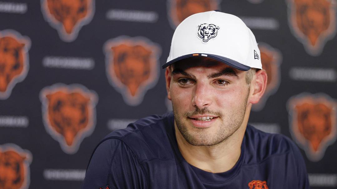 Jul 23, 2025; Lake Forest, IL, USA; Chicago Bears tight end Cole Kmet (85) speaks during training camp at Halas Hall. Mandatory Credit: Kamil Krzaczynski-Imagn Images