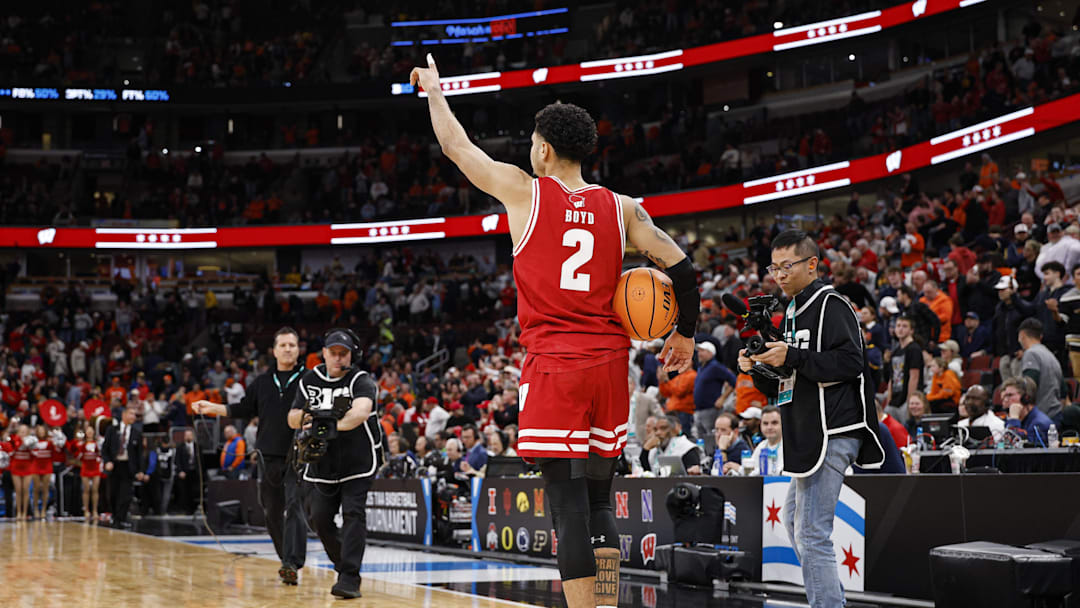 Mar 13, 2026; Chicago, IL, USA; Wisconsin Badgers guard Nick Boyd (2) celebrates after the game against the Illinois Fighting Illini at United Center. Mandatory Credit: Kamil Krzaczynski-Imagn Images
