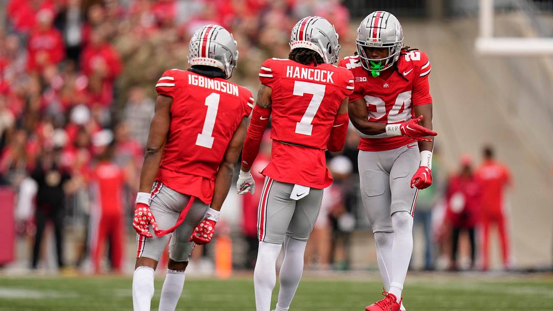 Oct 21, 2023; Columbus, Ohio, USA; Ohio State Buckeyes cornerbacks Davison Igbinosun (1), Jordan Hancock (7) and Jermaine Mathews Jr. (24) celebrate during the NCAA football game against the Penn State Nittany Lions at Ohio Stadium.