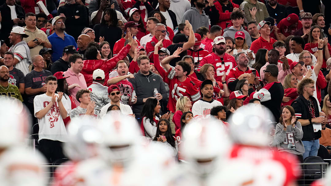 Ohio State Buckeyes fans cheer during the Cotton Bowl at AT&T Stadium in Arlington, Texas for the College Football Playoff quarterfinal game against the Miami Hurricanes on Dec. 31, 2025. Ohio State lost 24-14.